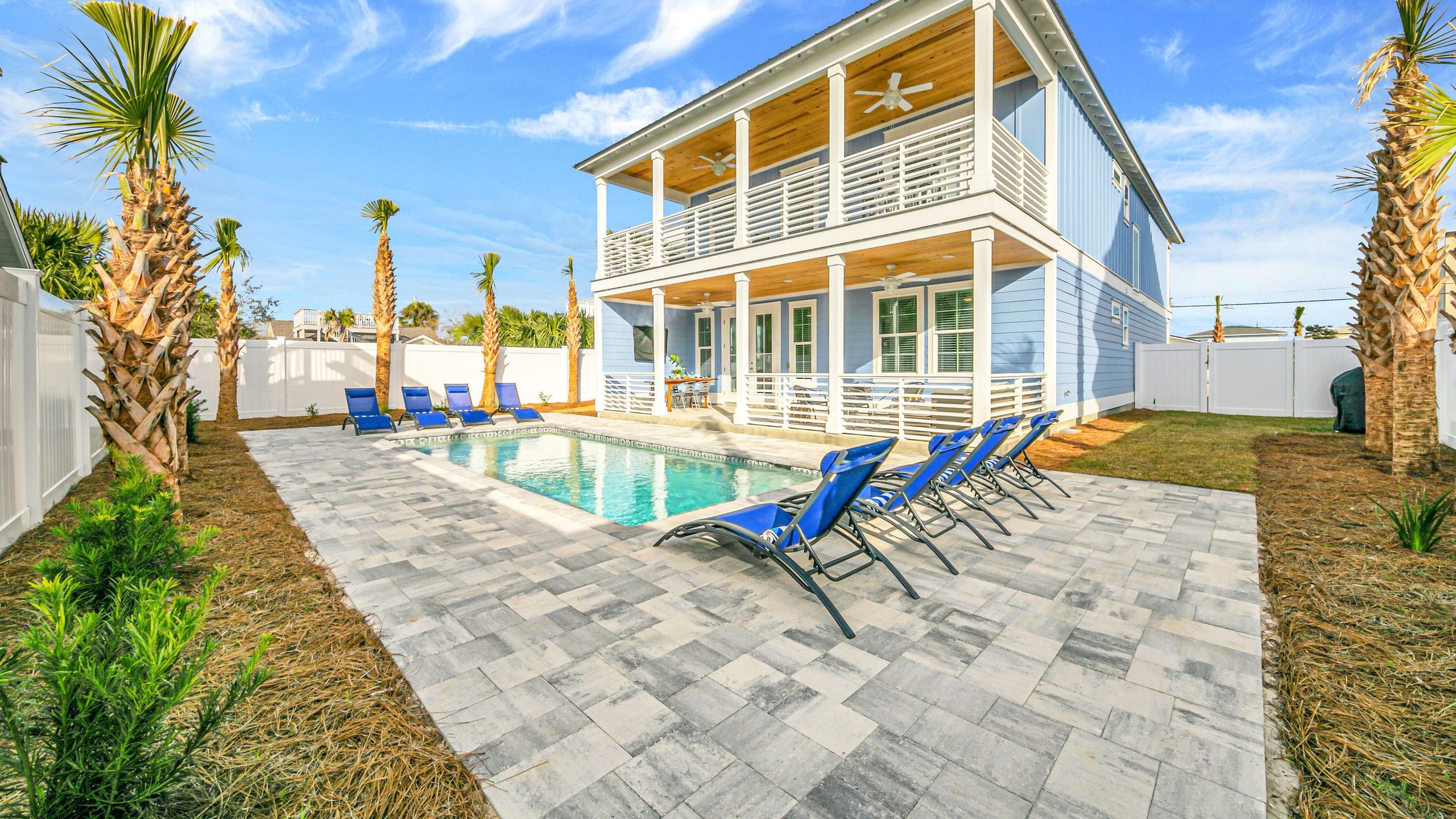 Outdoor Pool And Colorful Common Spaces - Exquisite Emerald Escape - Panama City Beach, FL